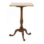 A George III Flip-Top Tripod Table, circa 1780, with baluster support and three cabriole legs, and A