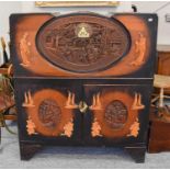 A 20th Century Chinese Carved Camphorwood Chest, fitted with a pair of cupboard doors, 101cm by 51cm