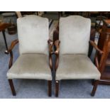 A Set of Six 1920s Oak Framed High Backed Dining Chairs, each with scroll open arms