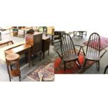 A Group of Furniture, comprising: Two Ercol Dark Elm Rocking Chairs, A Two-Tier Plantstand, Two