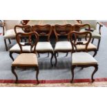 A Set of Six Victorian Mahogany Balloon Back Dining Chairs