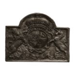 A Charles II Style Cast Iron Fire Back, with the Royal Arms and initials CR105cm wide