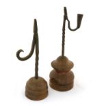 A Wrought Iron Rush Light Holder, late 18th/19th century, the hinged nips with monkey's tail