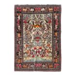 Isfahan RugCentral Iran, circa 1920The ivory field with a one-way design of plants and birds and