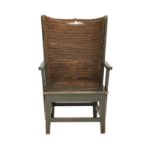 An Early 20th Century Green-Painted Pine and Rush-Back Orkney Chair, the curved back support and