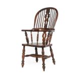 A Mid 19th Century Yew and Elm-Seated High-Back Windsor Armchair, the spindle back support with