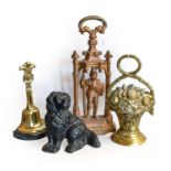 A William IV Brass Doorstop, of stiff-leaf cast bell shape on a marble base29cm highAn Edwardian