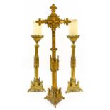 A Victorian Gilt Metal Three-Piece Altar Set, in Gothic style, the hexagonal columns applied with