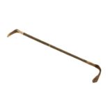 A Riding Crop, circa 1900, the horn handle with gold ferrule engraved with an earl's coronet and