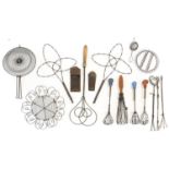 Assorted Kitchenalia, comprising wire work baskets, beaters, various implements, two nutmeg graters,