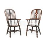 A Mid 19th Century Ash and Elm High-Back Windsor Armchair, the spindle back support with double