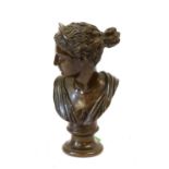 After the Antique: A Bronze Bust of Venus, on a circular socle inscribed F Barbedienne Fondeur and