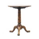 A George III Solid Yewwood Tripod Table, late 18th century, the circular one piece top on a turned