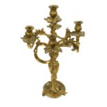 A French Gilt Metal Five-Light Candelabrum, in Louis XV style, with leaf-sheathed sockets, sconces