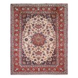 Isfahan CarpetCentral Iran, circa 1950,The ivory field of scrolling vines centred by a flowerhead