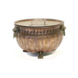 A Regency Style Copper Planter, early 20th century, of circular form, the gadrooned body with lion