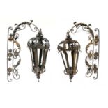 A Pair of Late 19th Century French Wrought Iron Wall Mounted Garden Lanterns, each of tapering