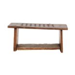 An 18th Century Provincial Oak and Pine-Sided Stool, of four-plank construction, the top with