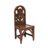 A Victorian Carved Oak Hall Chair, late 19th century, the back support with quatrefoil moulding