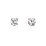 A Pair of Diamond Solitaire Earrings, the old cut diamonds in white four claw settings, total