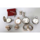 Three silver pocket watches, gold plated pocket watch, two silver napkin rings, silver sovereign