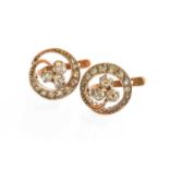 A Pair of Diamond Earrings, of swirl design, set throughout with rose cut diamonds, in white claw