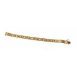 A 9 Carat Gold Fancy Tri-Coloured Brick Link Bracelet, length 18cmGross weight 19.7 grams.