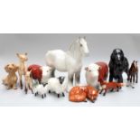 A Bewsick Hereford Bull 'Ch. of Champions' and Cow, boxed, together with other Beswick, Royal