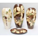 A Walter Moorcroft Chestnut Leaves Pattern Vase, on a brown ground, impressed factory marks and