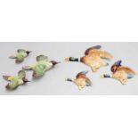 A Set of Three Beswick Graduated Woodpecker Wall Plaques, together with three similar Sylvac Mallard