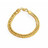 A 9 Carat Gold Curb Link Bracelet, length 20cmThe bracelet is in good condition with slight