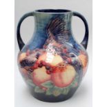 A Moorcroft Finches on Blue Pattern Twin-Handled Vase, designed by Sally Tuffin, impressed and