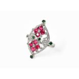 A Diamond, Synthetic Ruby and Green Garnet Cluster Ring, finger size LStamped '750'. Gross weight