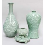 A Korean Celadon Pear Shaped Bottle Vase, decorated with cranes, 36cm; together with two similar