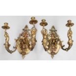 A Pair of Gilt Bronze Twin-Light Wall Sconces, each sconce supported by a cartyatid on acanthus