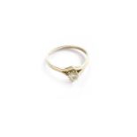 An 18 Carat Gold Diamond Solitaire Ring, the round brilliant cut diamond in a claw setting, to a
