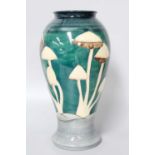 A Moorcroft Fairy Rings/Toadstool Pattern Baluster Vase, designed by Philip Richardson, impressed