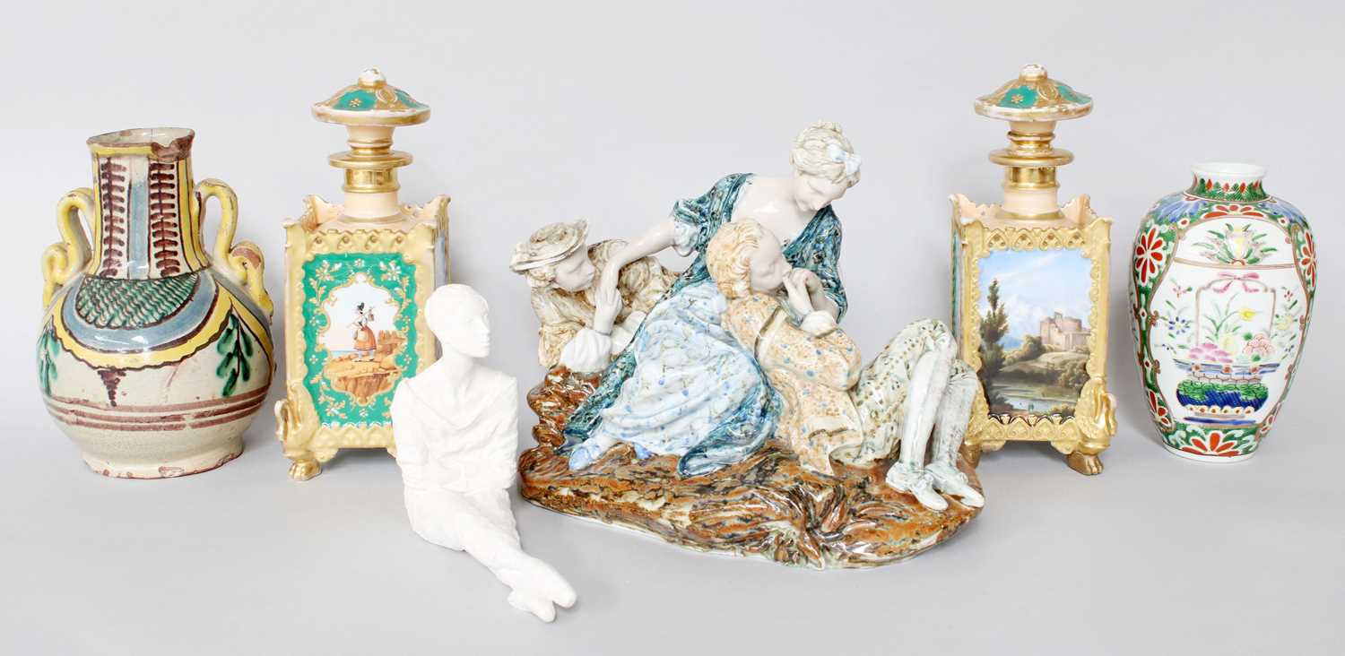 A Pair of French Porcelain Scent Bottles and Stoppers, Manner of Jacob Petit, 19th century, together