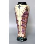A Moorcroft Foxglove Vase, designed by Rachel Bishop, impressed and painted marks, 37cm highGood