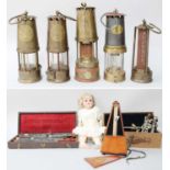 Five Brass Miners Safety Lamps, including Wolf, Eccles and Patterson, Simon & Halbig bisque head