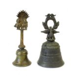 An Indian Bronze Bell, with fan cresting of figures of Garuda and attendant, on a spiral cast stem