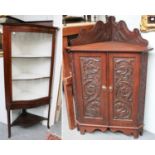 An Edwardian Mahogany Corner Display Cabinet, 75cm by 48cm by 162cm; together with a carved oak