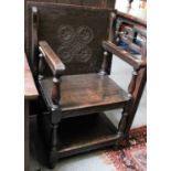 A Carved Oak Single Seat Monks Bench, early 20th century, 61cm by 45cm by 90cm