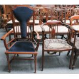 An Art Nouveau Mahogany Arm Chair, upholstered seat and back, on turned front legs, 107cm high and