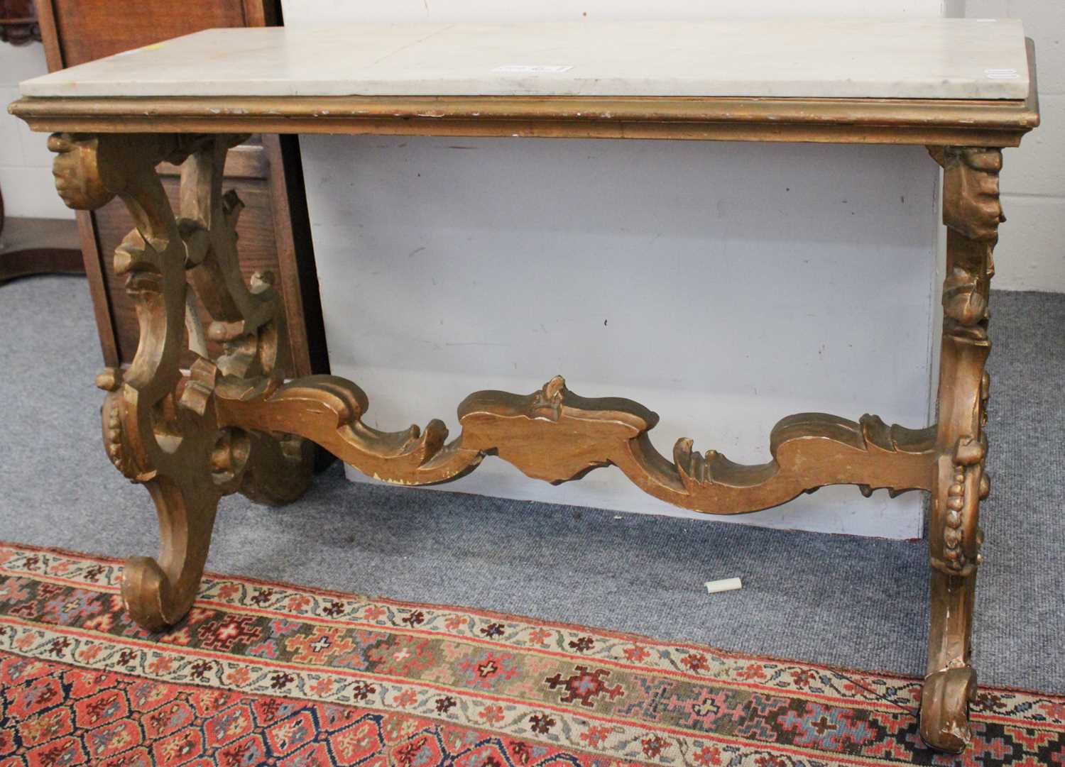 An Italian 19th Century Carved Giltwood Console Table, with marble top, 120cm by 49cm by 80cm