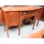 A 19th century Mahogany Serpentine Sideboard, inlaid and on square tapering supports, 153cm by