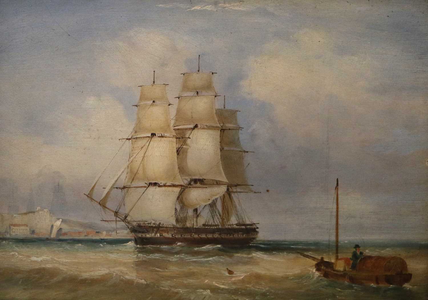 Circle of Henry Redmore (1820-1887)Masted ship at full sail before coastal town Oil on panel,