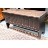A Reproduction Carved Oak Six Plank Coffer, 98cm by 31cm by 48cm