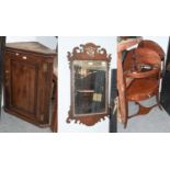 Two Georgian Mahogany Washstands; together with an oak corner cupboard; together with a Georgian