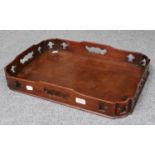 A Georgian Mahogany Rectangular Serving Tray, with open worked shaped sides, 57cm by 41cm